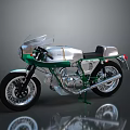 Vintage Green and Silver Motorcycle with Windshield Chrome Details and Black Tires