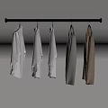 Metal Clothes Rack With Five Different Style And Color Clothes On Gray Background 3d model