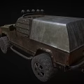 Rugged Off Road Vehicle Featuring Spiked Front Plow and Roof Mounted Spotlights