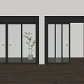 Modern Glass Sliding Doors With Black Frames Transparent Glass White Vase Green Plant