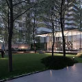 Modern Residential Landscape With High Rise Building Trees Lawn Glass Structure Pathway And Evening Lighting
