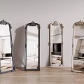 Different Colored Full Length Mirrors With Carved Frames Against Wall Reflecting Interior On Wooden Floor
