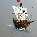 Floating Pirate Ship Model With Skull Flag White Sails And Water Reflection