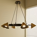 Modern Gold Cone Shaped Chandelier With Black Frame In Room With Blinds