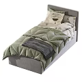 Cozy Single Bed with Green Quilt Pink Comforter Decorative Pillows and Wooden Headboard