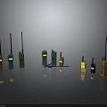 Various Colored Walkie Talkies With Antennas On Gray Surface