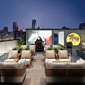 Rooftop Bar Outdoor Seating With Green Plants Water Feature And City Night View