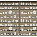 White Ceramic Dinnerware Set With Bowls Plates Cups And Vases Arranged On Wooden Shelves
