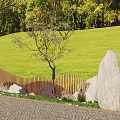 Wooden Entry Gate With Green Lawn Trees Stones And City Buildings Background