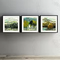 Three Framed Landscape Paintings Hanging on Gray Wall with Mountain Scenery and Seasonal Trees