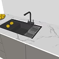 Modern Kitchen Faucet With Black Sink And Fresh Lemons On White Marble Countertop