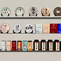 Household Items Displaying Tea Cakes Boxes And Colorful Storage Cans On Shelves