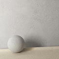 Textured Gray Wall Component With White Spherical Object On Light Surface