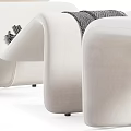 Modern Curved Lounge Chairs In White Brown Blue With Throw Blankets And Ottoman