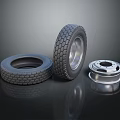 Car Tires With Deep Tread Pattern And Shiny Metal Rim On Reflective Black Surface