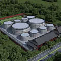 Industrial Plant With Large Storage Tanks Surrounded By Green Trees And Traditional Style Buildings