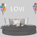 Round Bed Design With LOVE Letter Decor And Colorful Balloons And Pillows