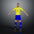 Brazilian Football Player In Yellow Jersey And Blue Shorts With Number 9 Standing On Gray Background