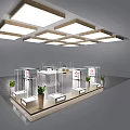 Modern Exhibition Hall With XINUI Logo Display Counters Racks And Ceiling Lights 3d model