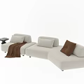 Modern Beige Sectional Sofa With Pillows Throw Blanket And Side Table 3d model