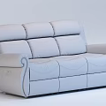 Dark Blue Leather Three Seater Sofa With Curved Arms And Stitched Details