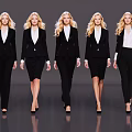 Group of Five Blonde Women in Black Suits and White Shirts Standing