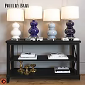 Decorative Ornament Set With Colorful Table Lamps Gold Candle Holders And Books On Black Shelf