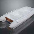 White Inflatable Yacht With Brown Interior Section And Reflective Surface