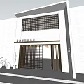 Modern Storefront Facade With White Wall Black Lattice Windows Brown Door Red Bicycle And Cactus