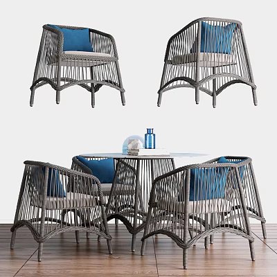 Rattan Table And Chairs Set With Round Top And Blue Cushions For Indoor Use 3d model