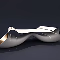 Modern Sleek Coffee Table With Curved Design And Metallic Glossy Finish