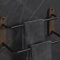 Modern Bathroom Towel Rack Featuring Wooden Black Metal And Gray Towels On Dark Marble Wall
