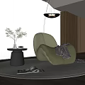 Green Lounge Chair with Quilted Texture Throw Blanket Side Table Plants and Pendant Light
