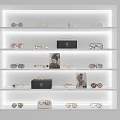 Elegant Jewelry Display Shelves with Illuminated Layers Black Boxes and Accessories