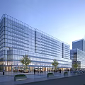 Tall Modern Glass Curtain Wall Office Building With Pedestrian Plaza Trees And Evening Sky