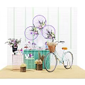 Decorative Scene Featuring Light Blue Bicycle Wicker Basket Purple Wheel Flowers And Green Cabinet