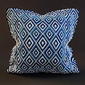 Vibrant Geometric Throw Pillows Featuring Diamond Shapes And Striped Patterns