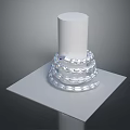 Silver Snake Coiled Around White Cylindrical Pillar On White Square Platform With Dark Background