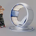 Woman Standing Next to Modern Circular Spaceship Style Seat With Screen and Comfortable Design