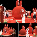 Vibrant Red Rabbit Themed Exhibition Scene With People And Decorative Elements 3d model