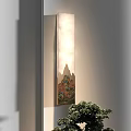 Artistic Wall Sconce With Colorful Floral Patterns And Warm Glow Near Green Foliage Decoration