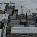 Snowy Traditional Village Landscape with Snow Covered Roofs Old Houses and Walled Courtyards
