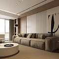 Modern Living Room Interior Featuring Beige Sofa Round Coffee Table Floor Lamp And Wall Art