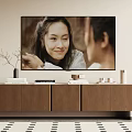 Modern Brown Wooden TV Stand with TV Vase Books Small Boxes and Decorative Items