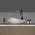 Modern Minimalist Bathroom Vanity With White Curved Washbasin Brass Faucet Soap Bottles And Green Plant