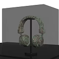 Ancient Bronze Earring Sculpture With Intricate Carving In Transparent Museum Display Case