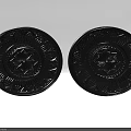 Two Black Decorative Lamp Plates With Intricate Floral Patterns And Central Design