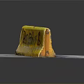 Yellow Road Barrier With Graffiti Featuring BOBA Text And Symbol On Concrete Ground