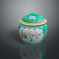 Decorative Ceramic Jar With Green Lid And Colorful Figure Patterns 3d model