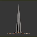 Tall Pointed Top Monument Structure With Green Lawn And Red Plaque Base